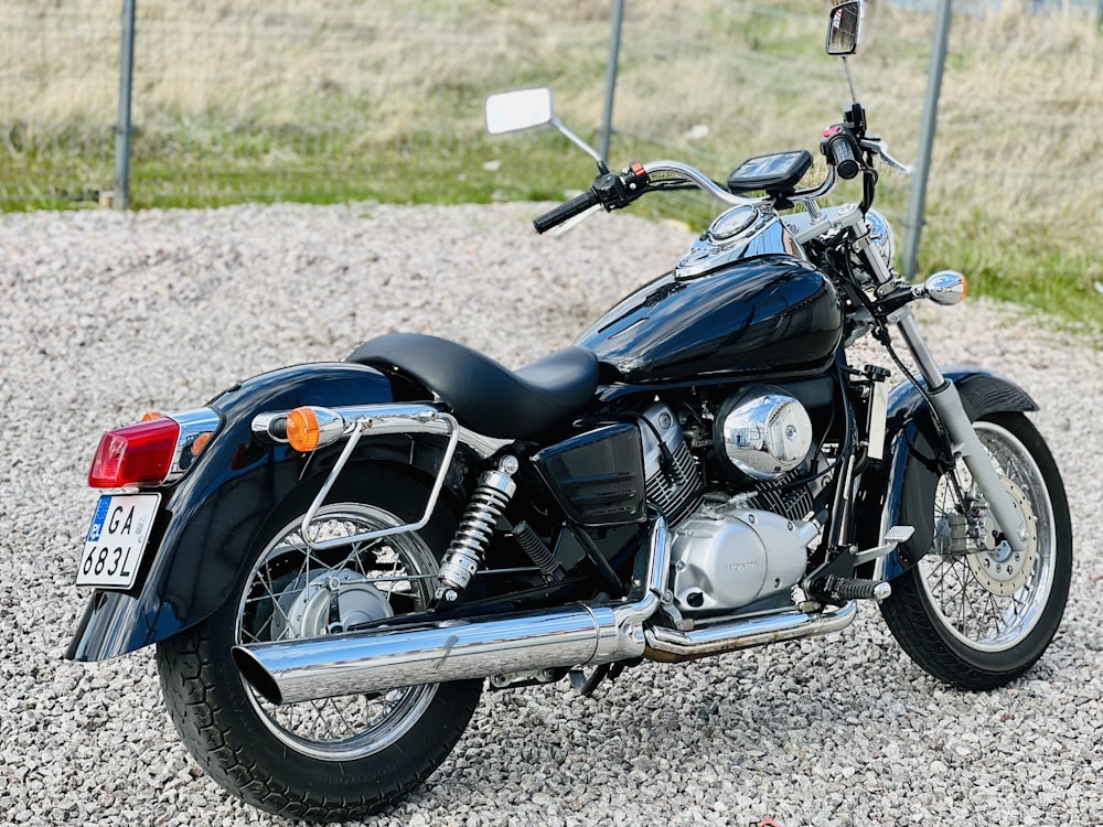 a motorcycle parked on gravel