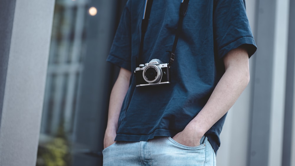 a person holding a camera