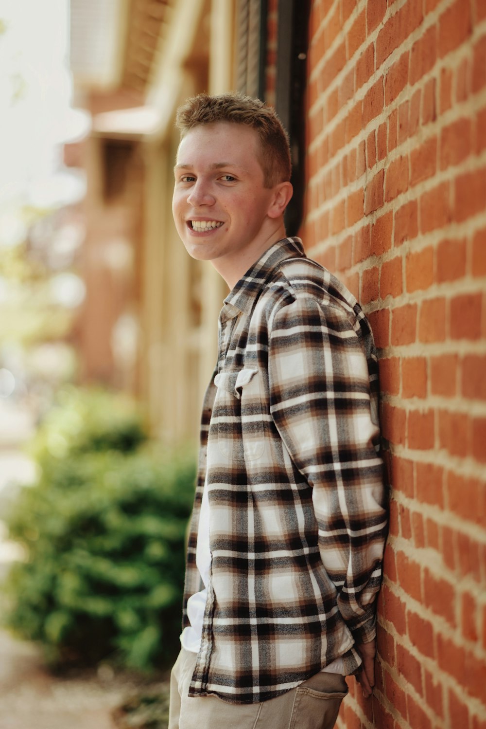 a boy smiling for the camera