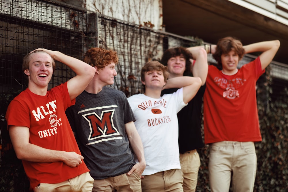 a group of men posing for a picture