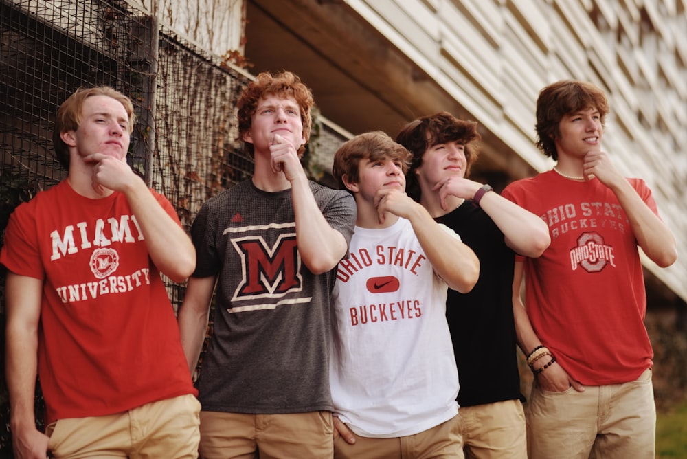 a group of men posing for a picture