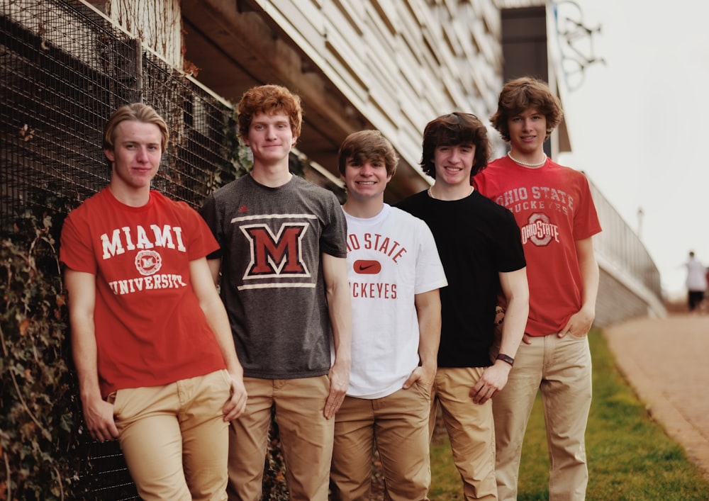 a group of men posing for a picture