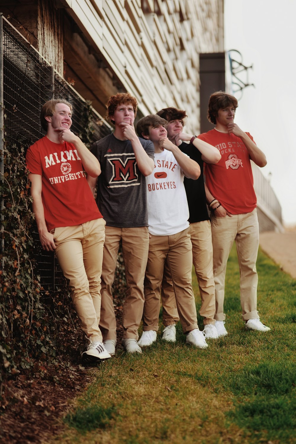 a group of men posing for a picture