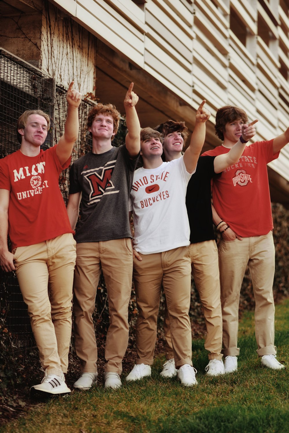 a group of men posing for a picture