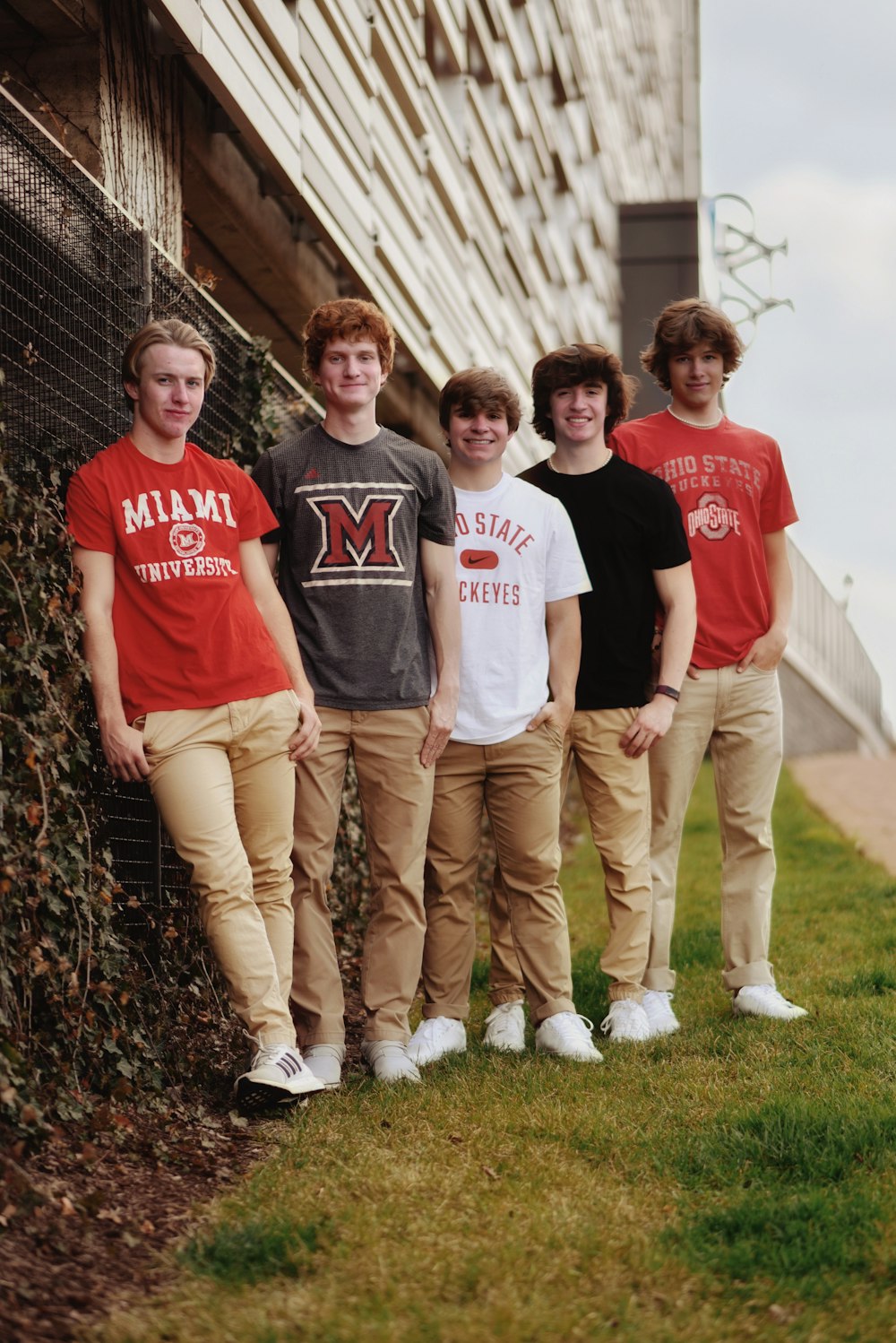 a group of men posing for a photo