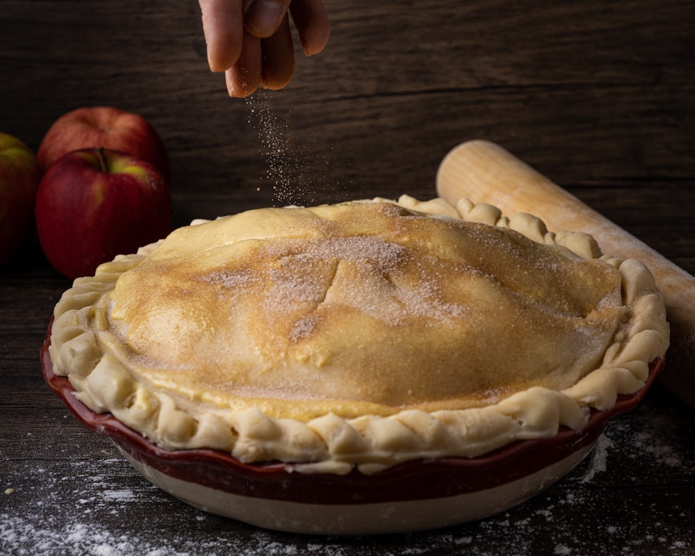 a pie with a banana on top