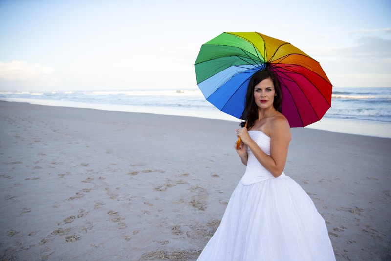 Playful beach umbrella moment