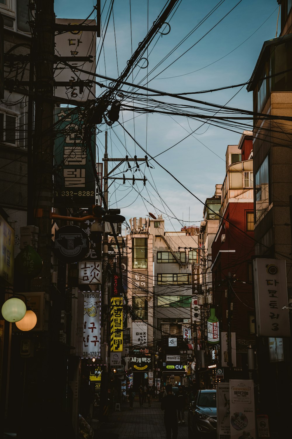 a city street with many signs