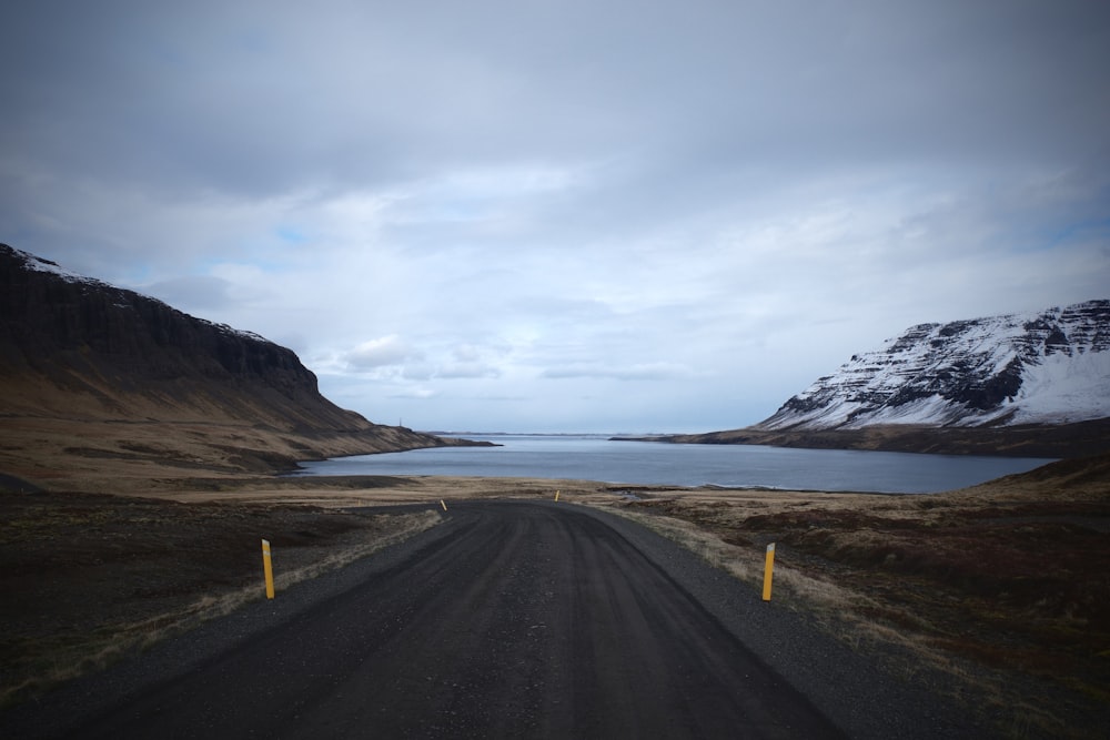 a road with snow on the side