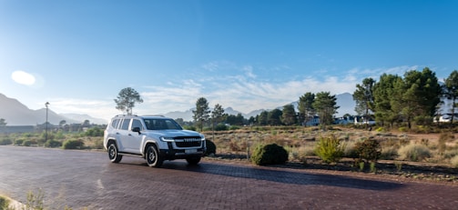 A family enjoying a road trip in a spacious SUV.