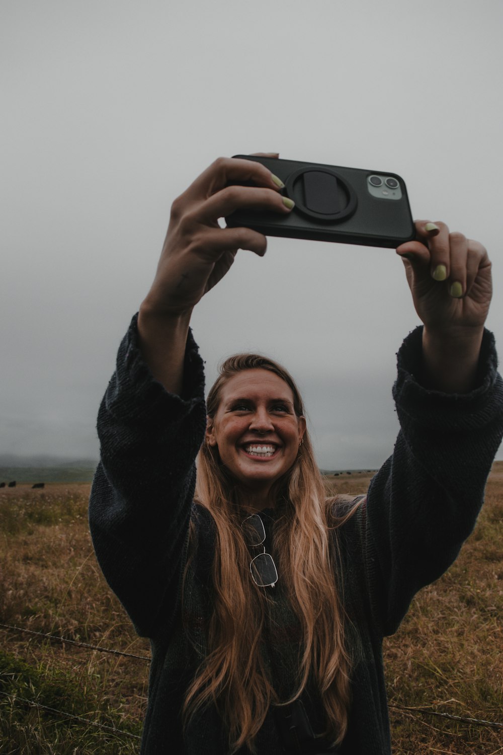 a person holding a camera