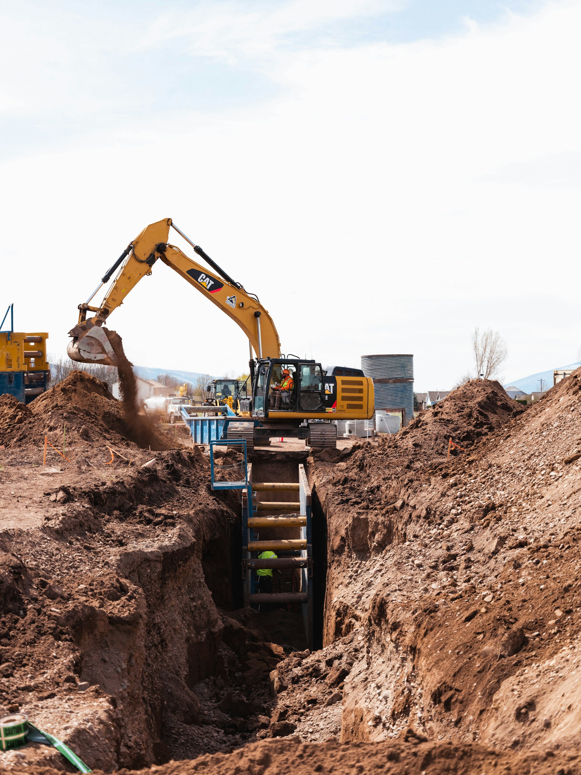 a construction vehicle in a dirt field