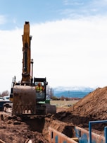 a bulldozer in a dirt field