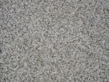 a close up of a grey surface