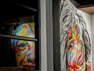 A colorful, expressive portrait painted on stretched canvas.