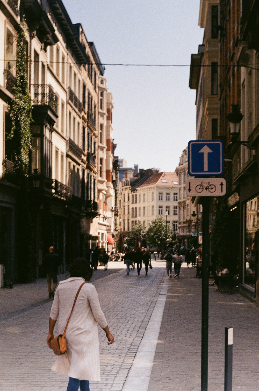 a person walking down a street