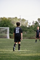 a boy in a black shirt