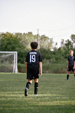 a boy in a black shirt