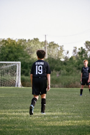 a boy in a black shirt