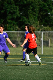 a group of people play football