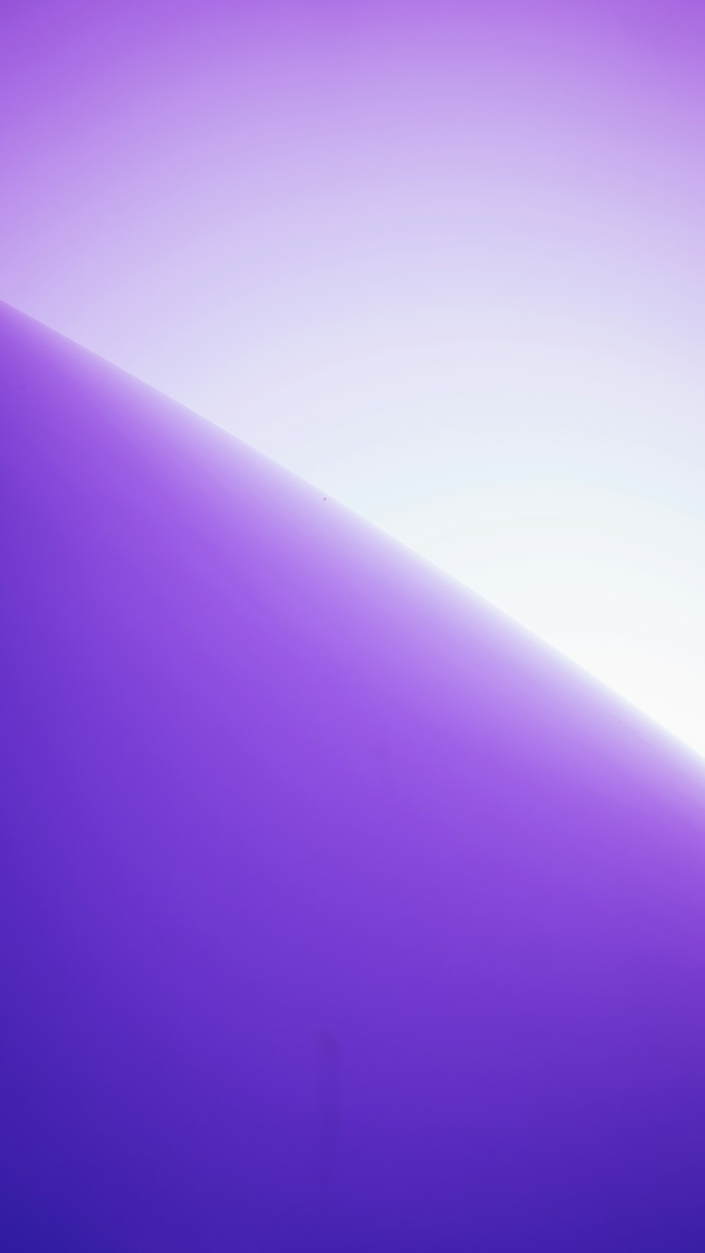 a close up of a purple background