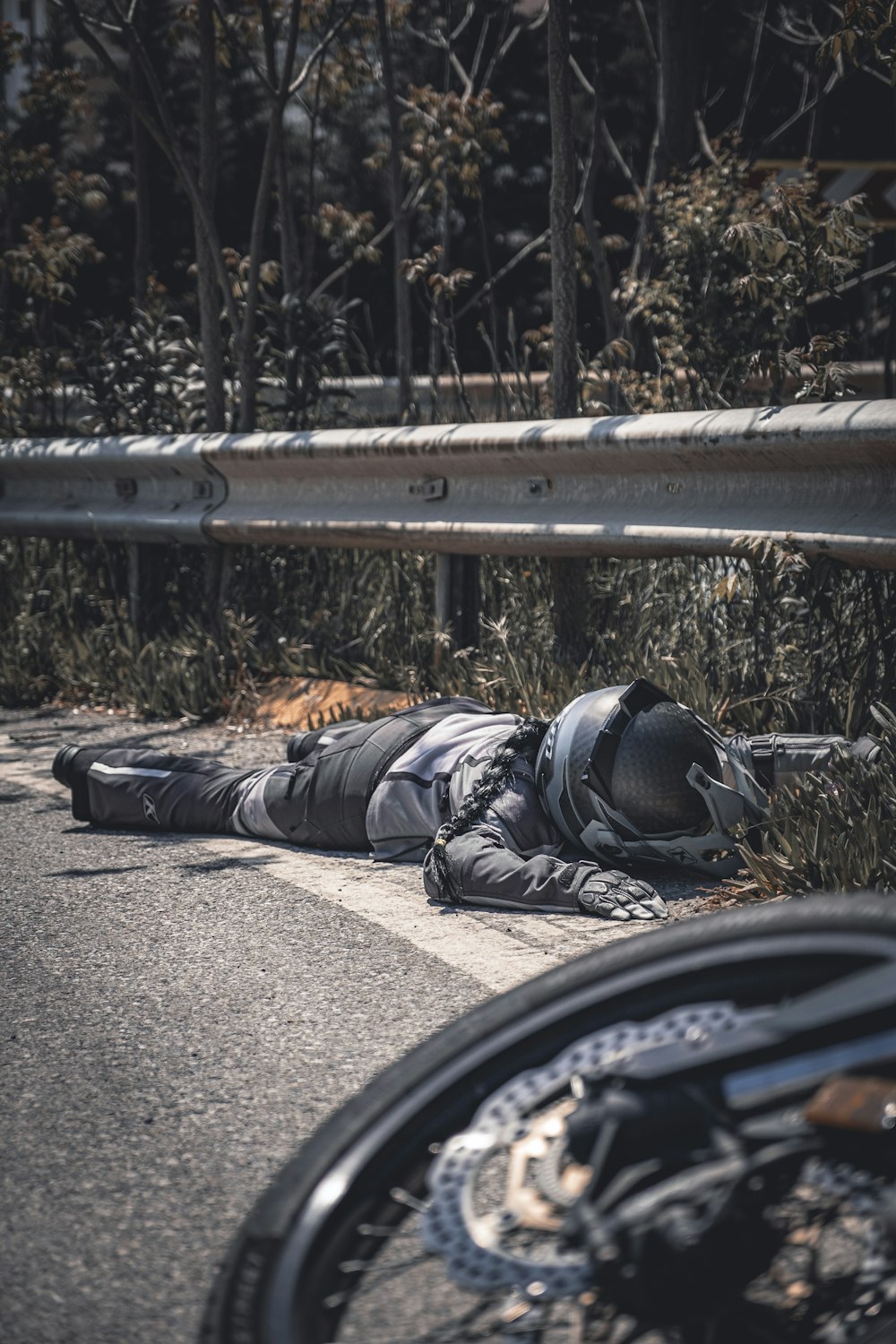 a person lying on a bench