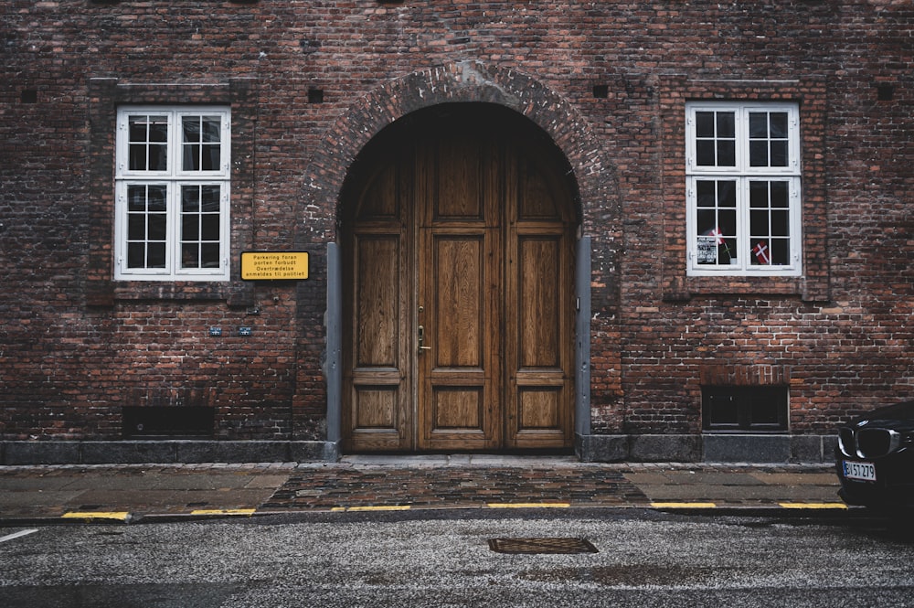 a brick building with a large door