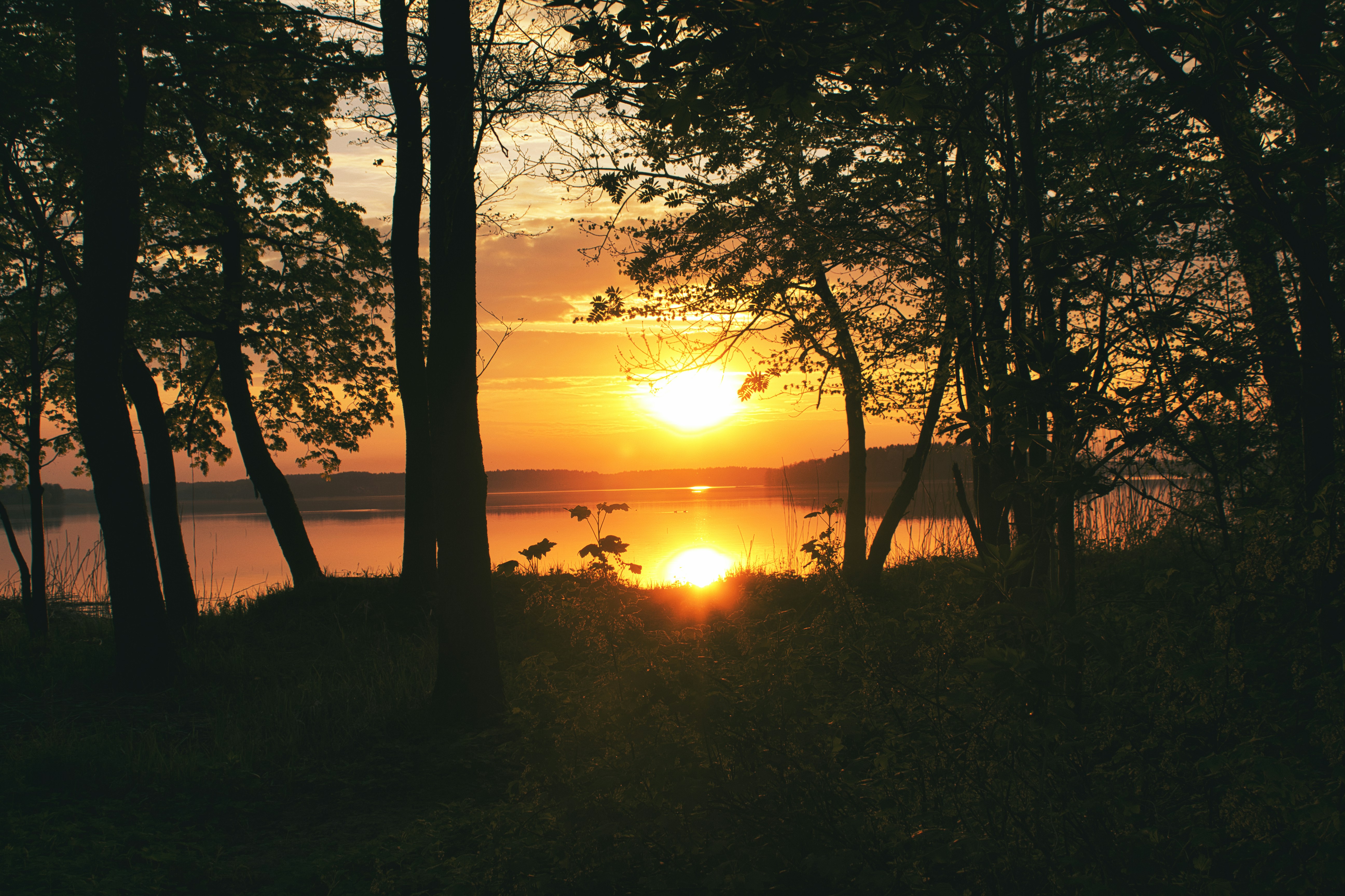 a sunset over a beach