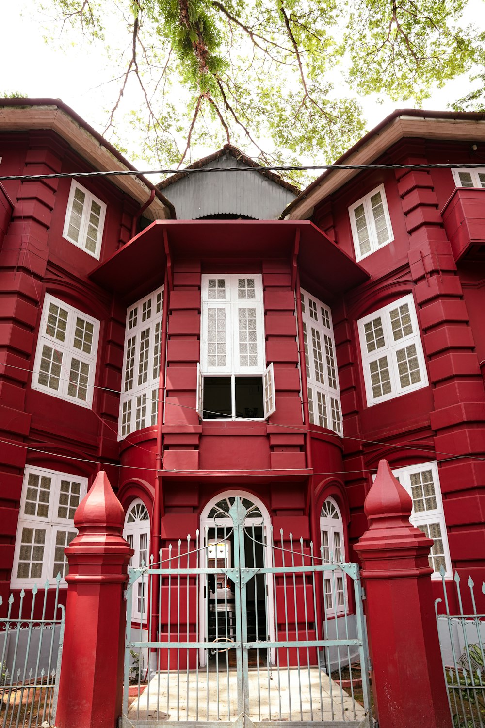 a red building with a gate