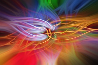 a close up of a colorful flower