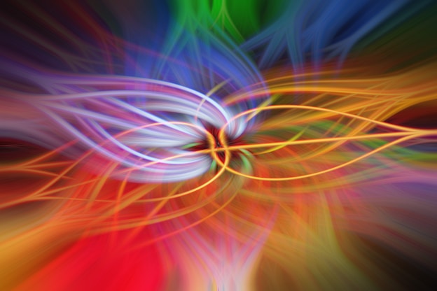 a close up of a colorful flower