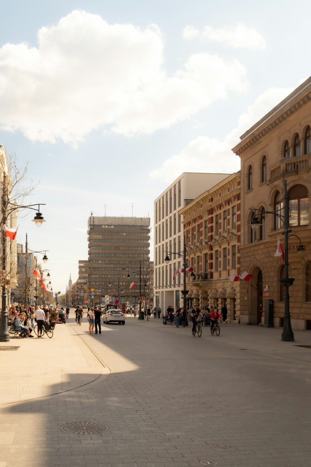 a street with buildings and people