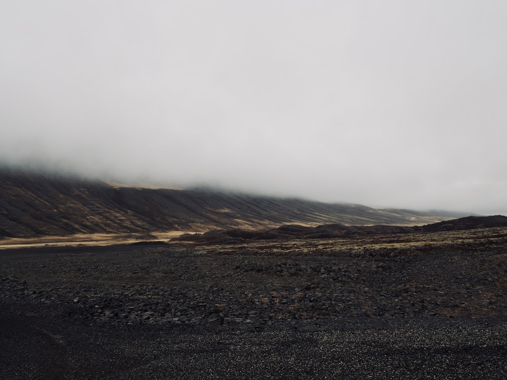 a landscape with hills in the back