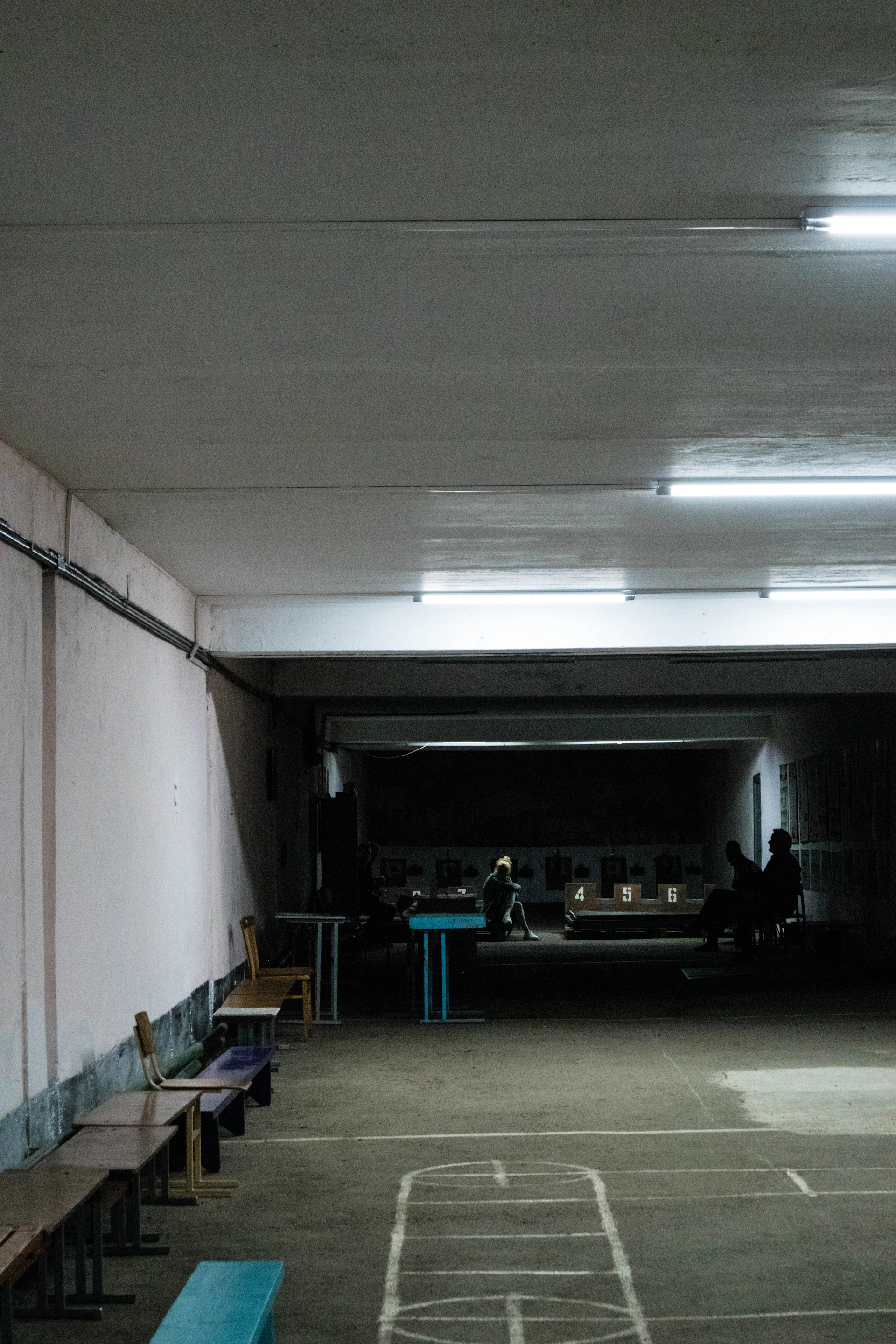 woman wearing yellow long-sleeved dress under white clouds and blue sky during daytime
