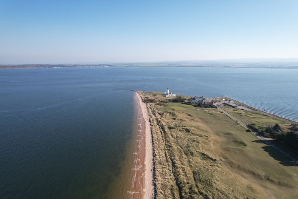 a road next to a body of water