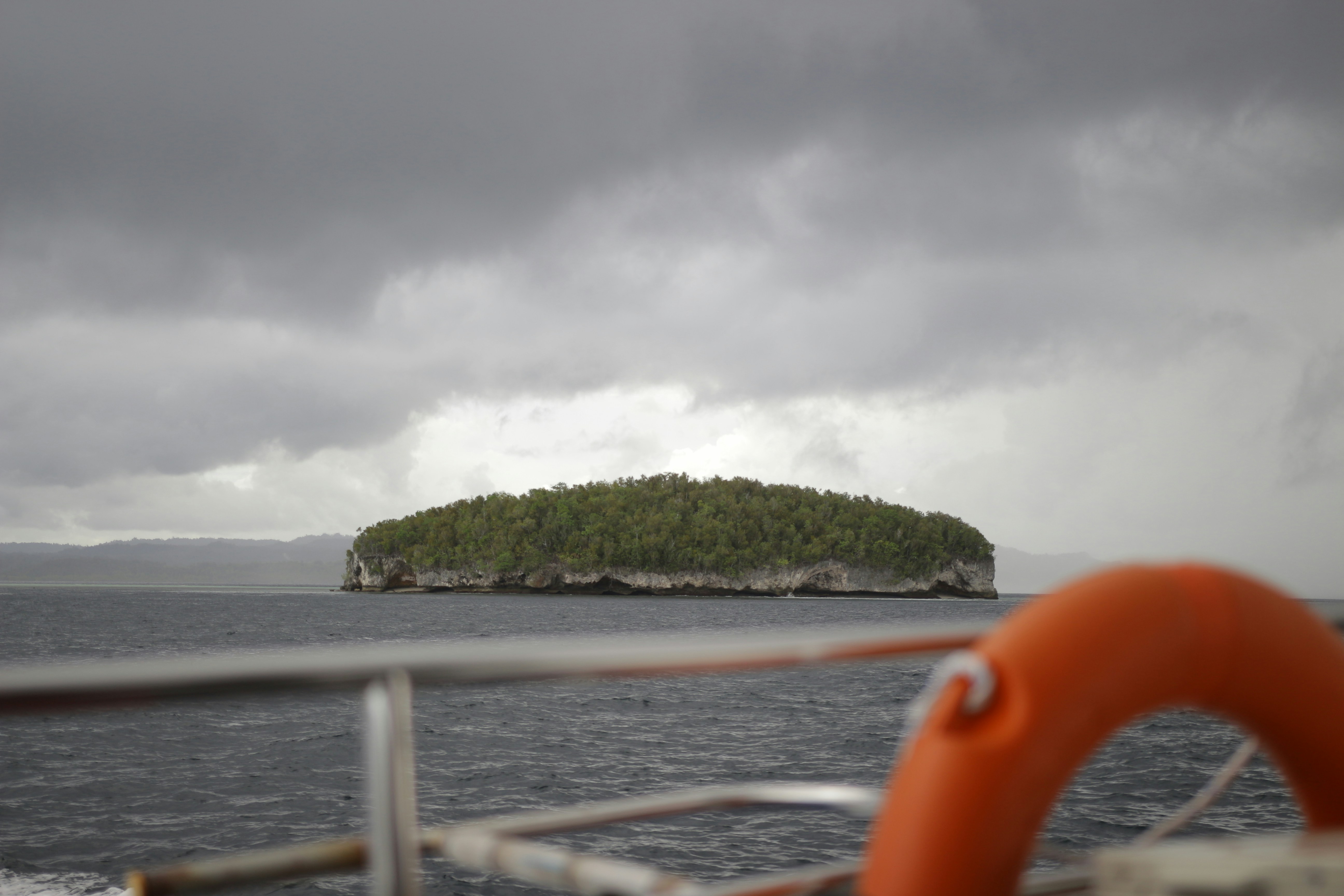 a body of water with a land in the distance