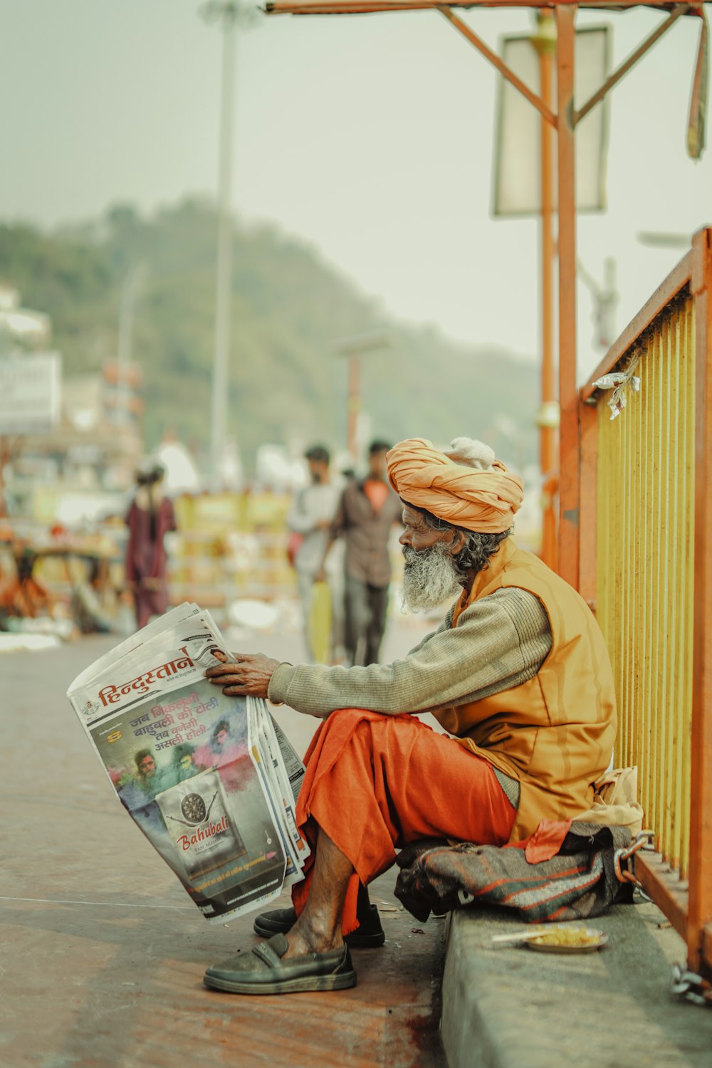 a person reading a newspaper