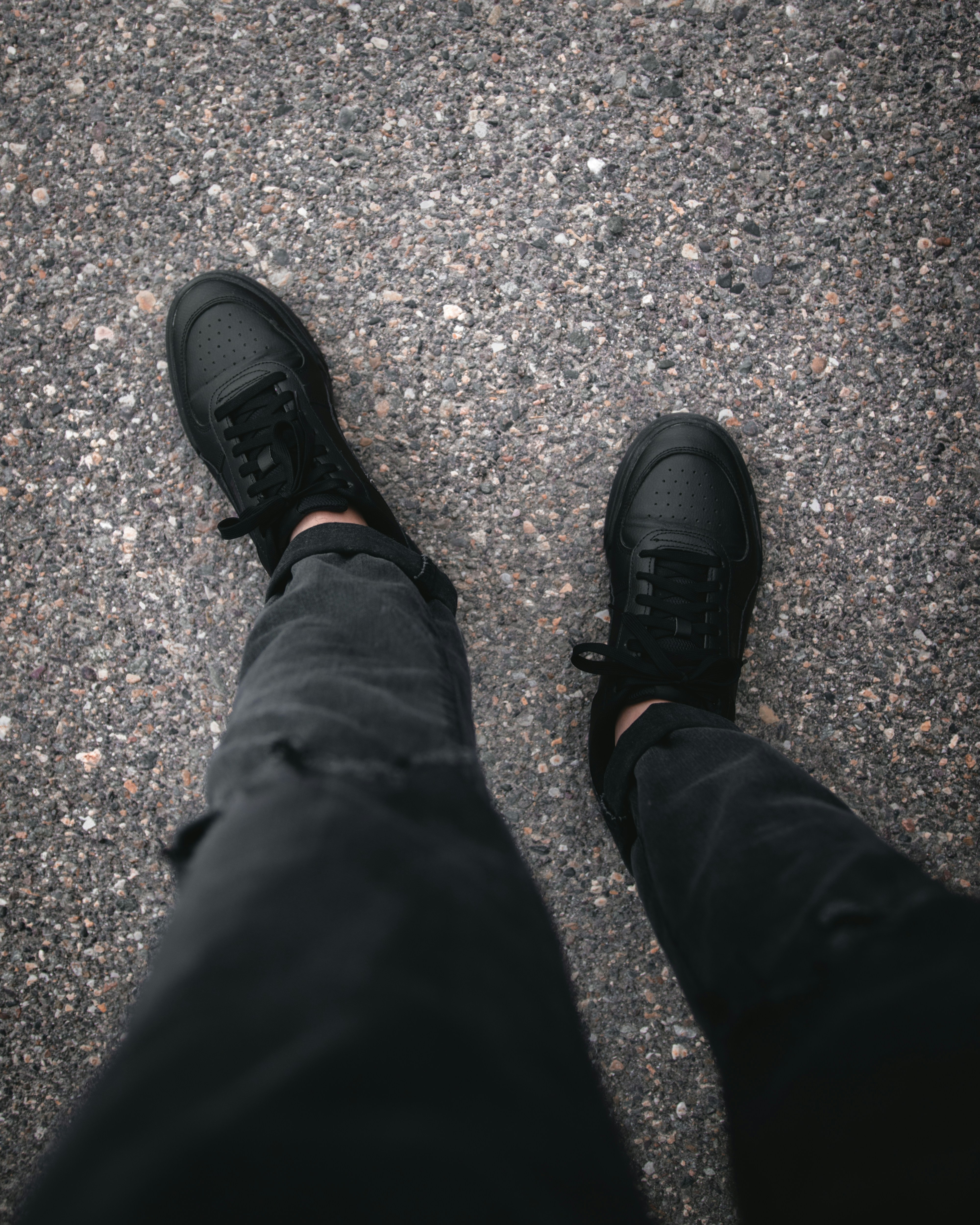 a person's legs and shoes