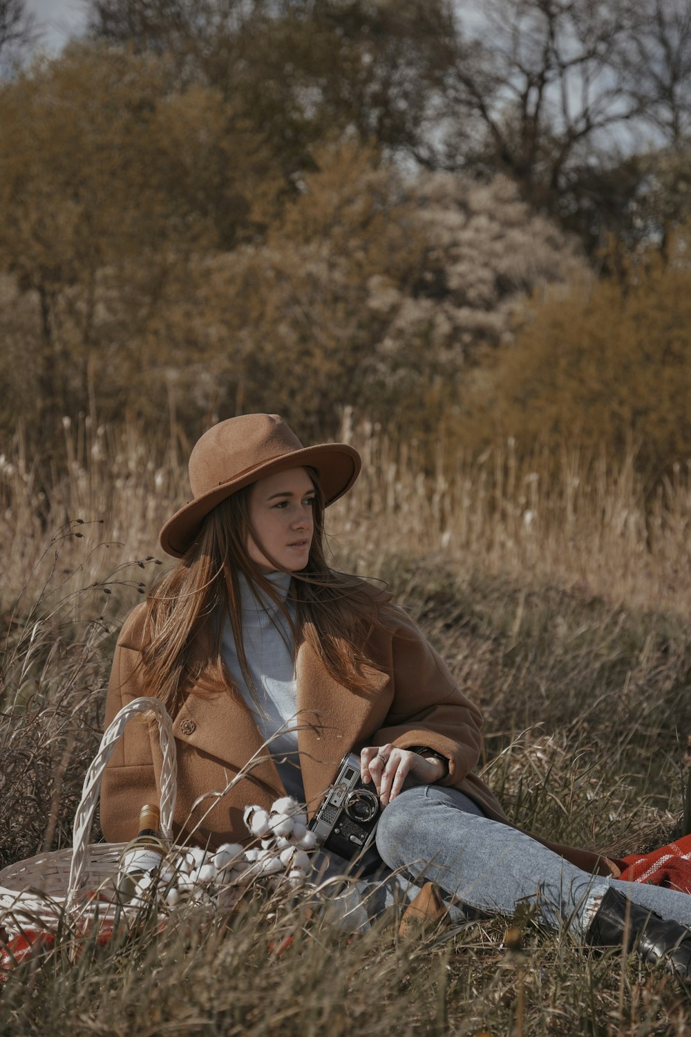 a person sitting in a field