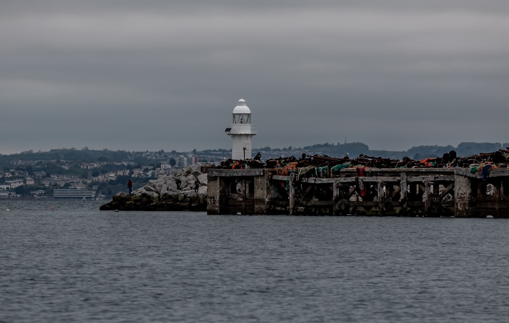 a lighthouse on a rocky island