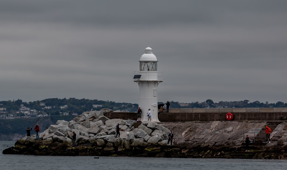 a lighthouse on a rocky shore