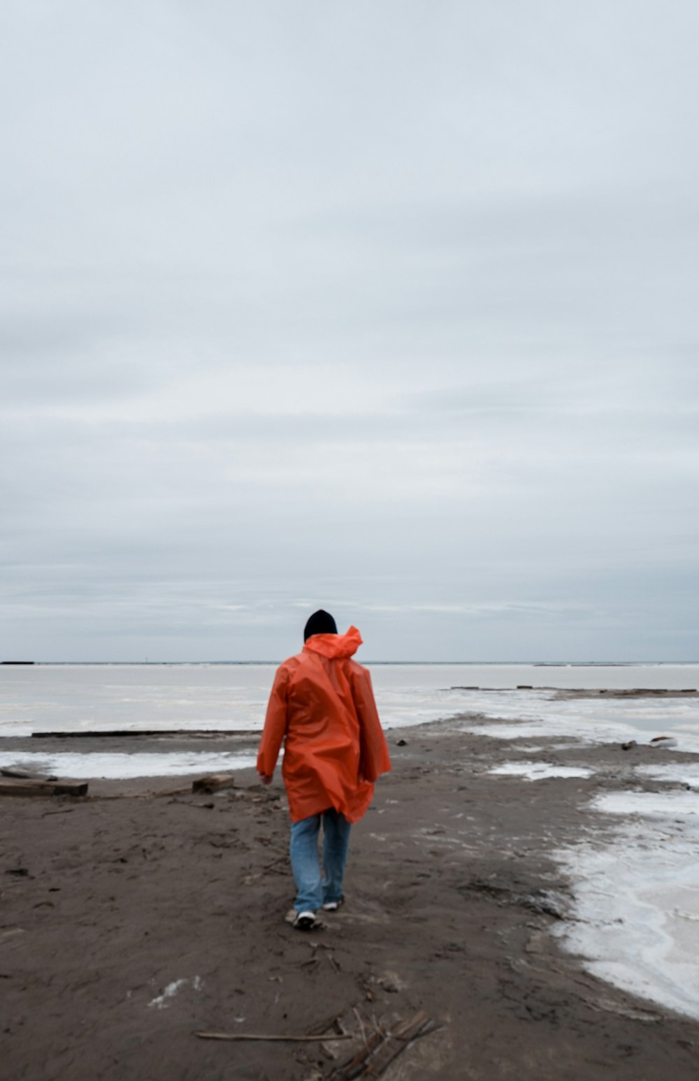 a person walking on a beach