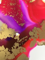 A captivating NFT artwork with a blend of red and gold hues.