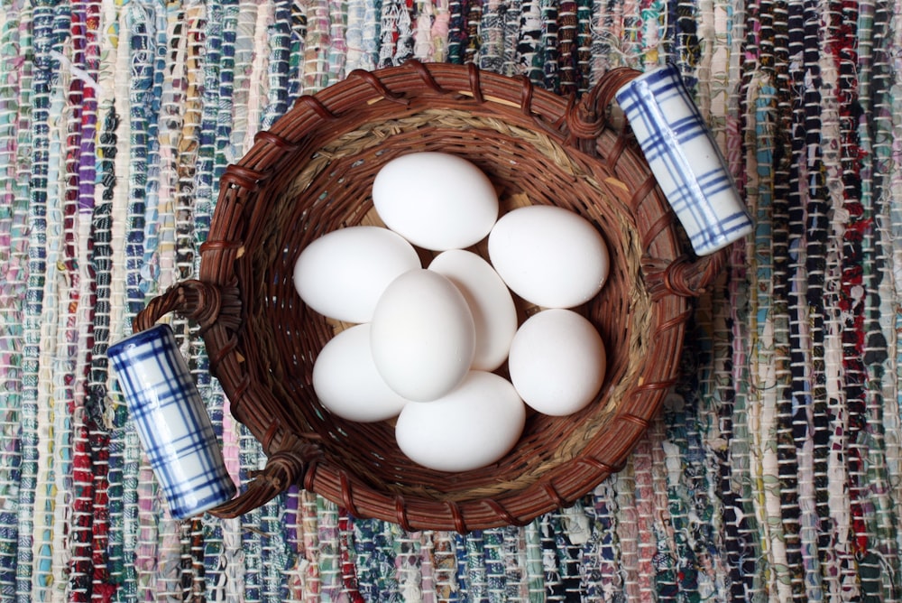 a basket with eggs in it