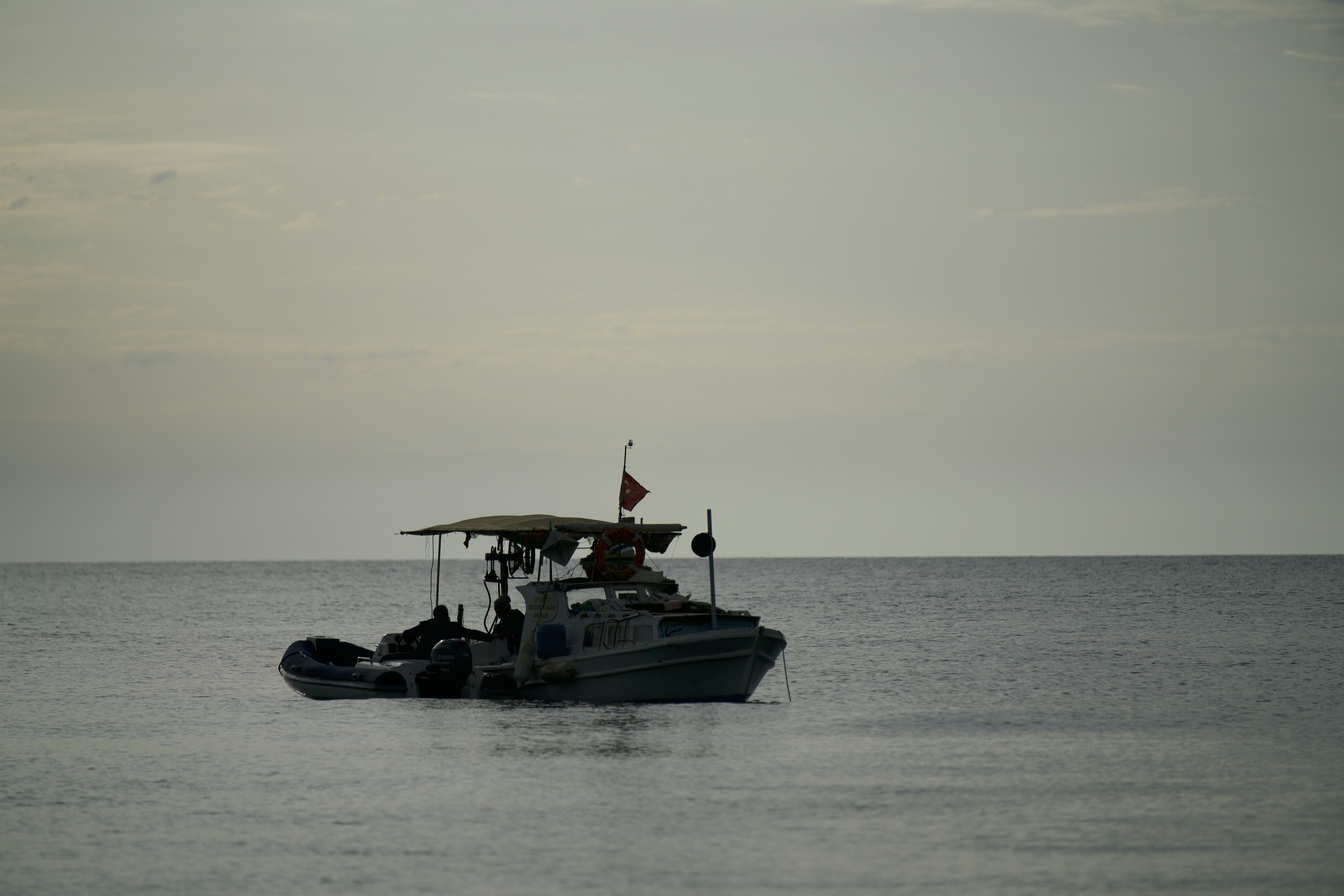 a boat sailing on the sea
