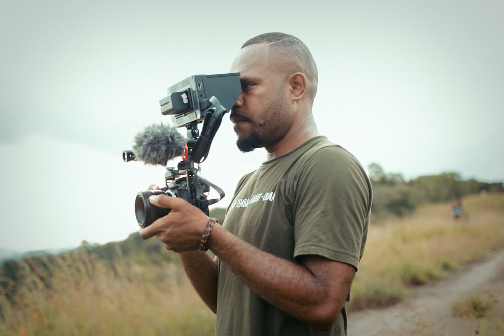 a man holding a camera