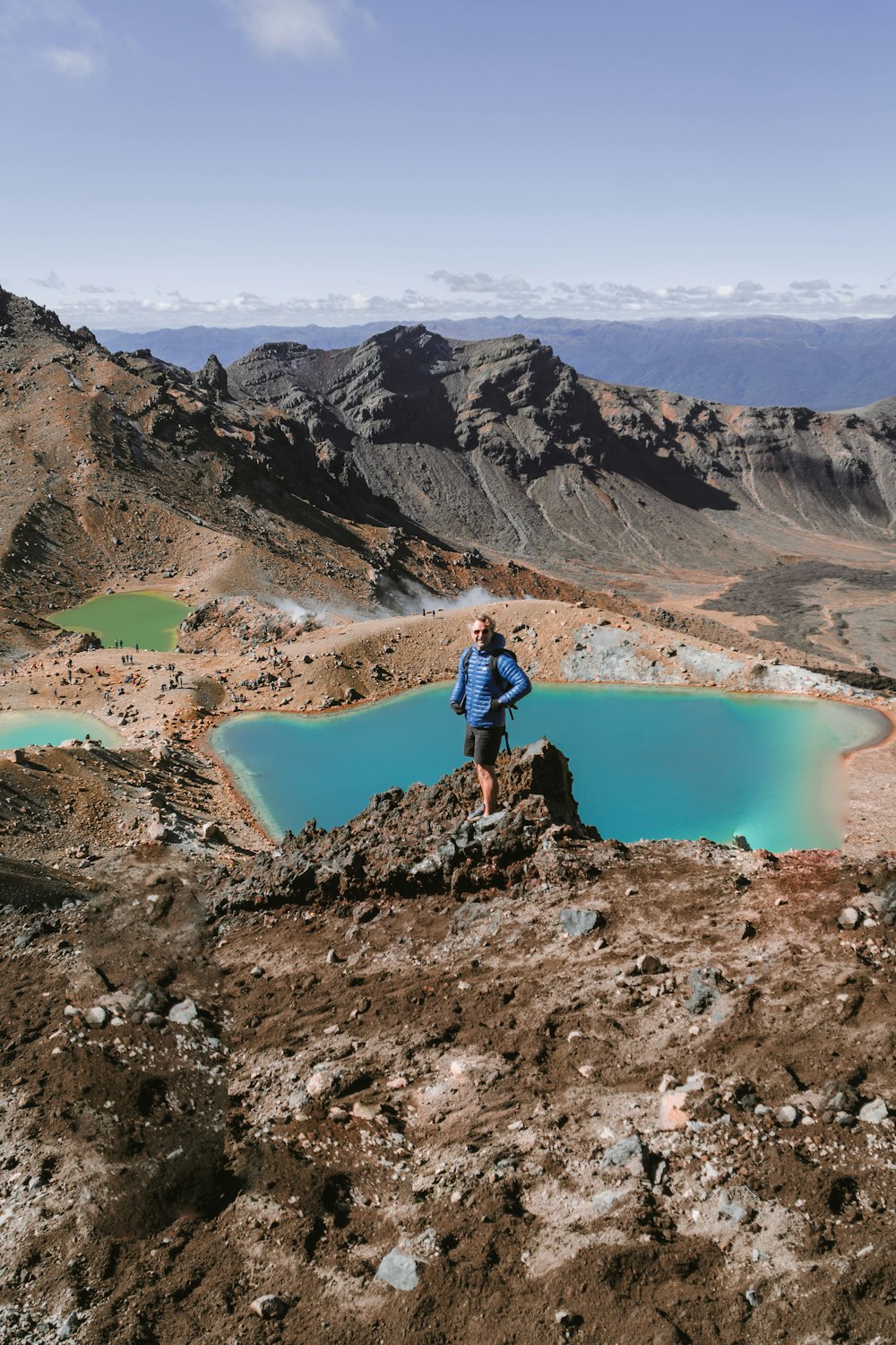 a person standing on a rock