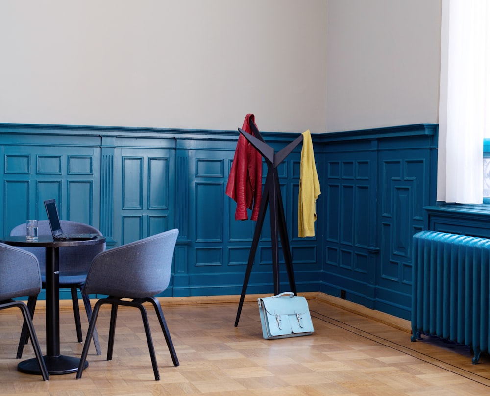 a room with blue doors and tables