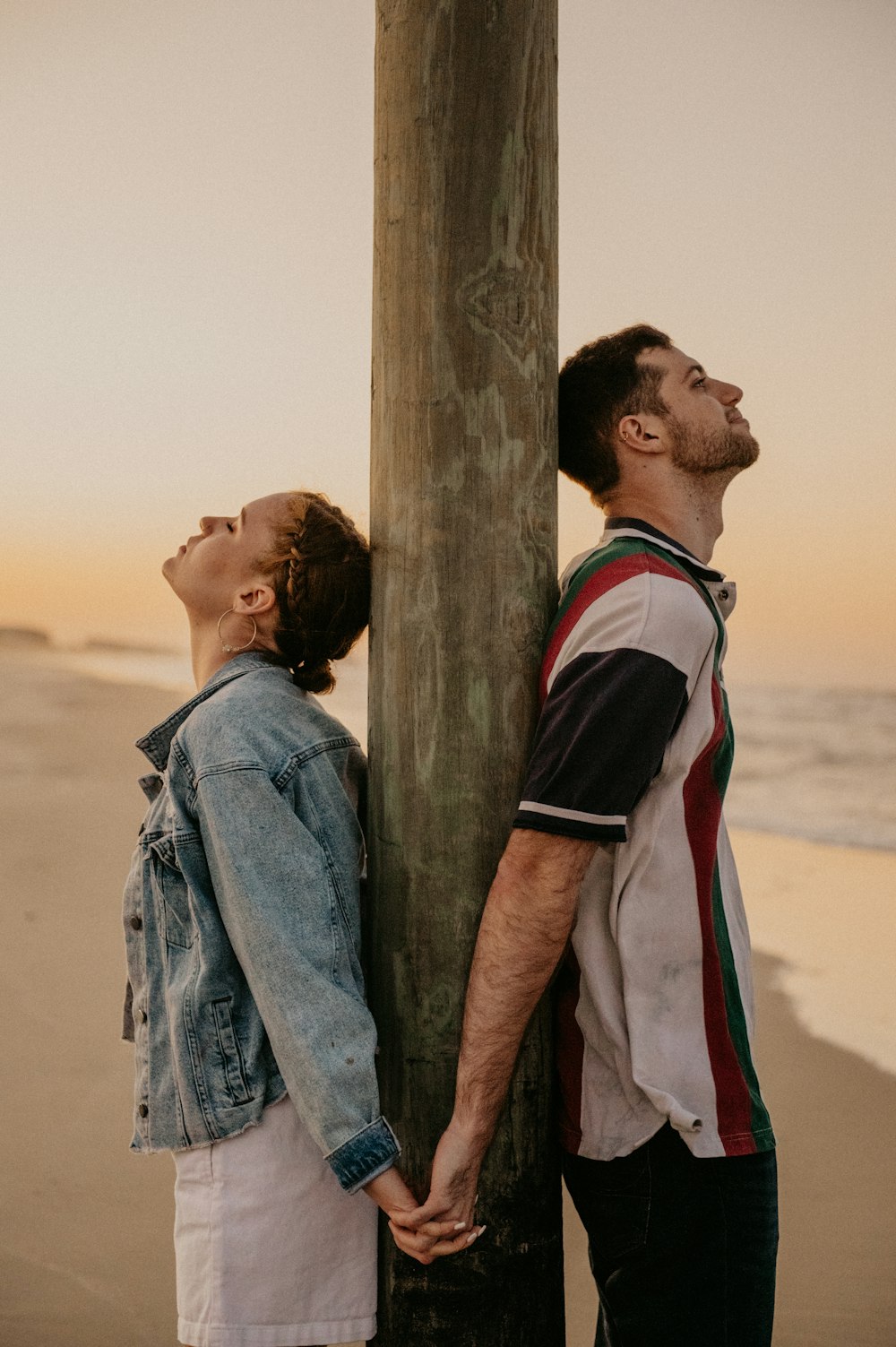 a man and woman kissing