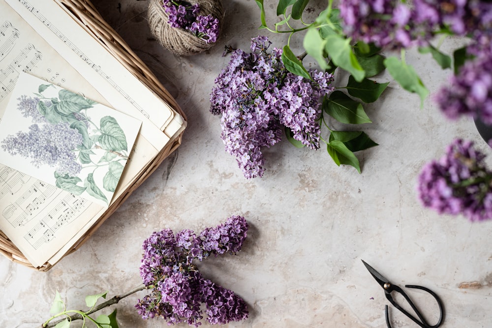 a book and flowers on a table